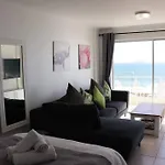 Beachfront Apartment + Pool + Secure Garage